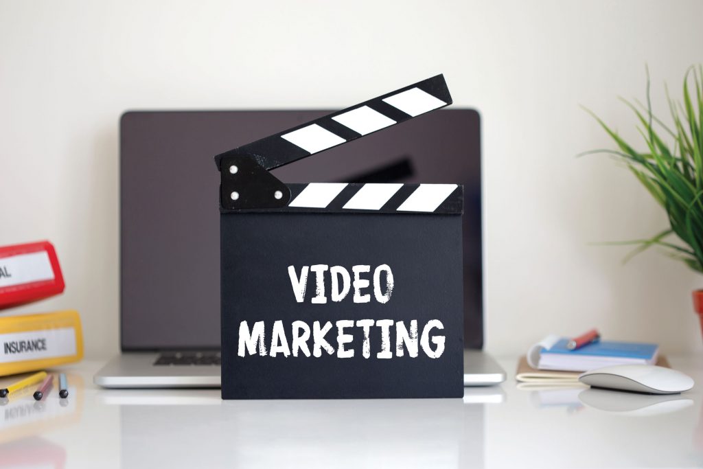 Clapper with Video Marketing word